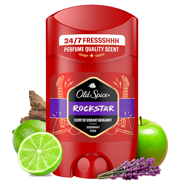 Old Spice Rockstar deodorant stick in red packaging labeled ‘24/7 Fresh,’ surrounded by lime, green apple, lavender, and wood to represent fragrance notes.